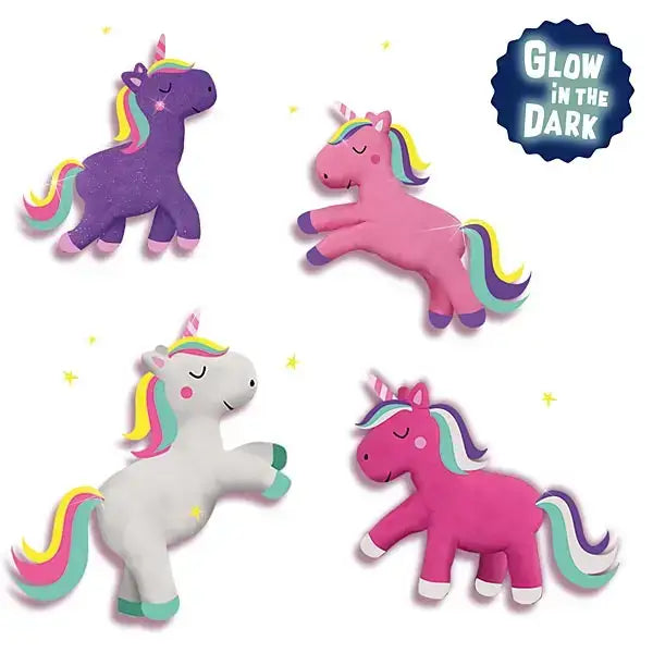 Glow-in-the-dark unicorn magnets in purple pink white and magenta with rainbow manes from elico unicorn dough