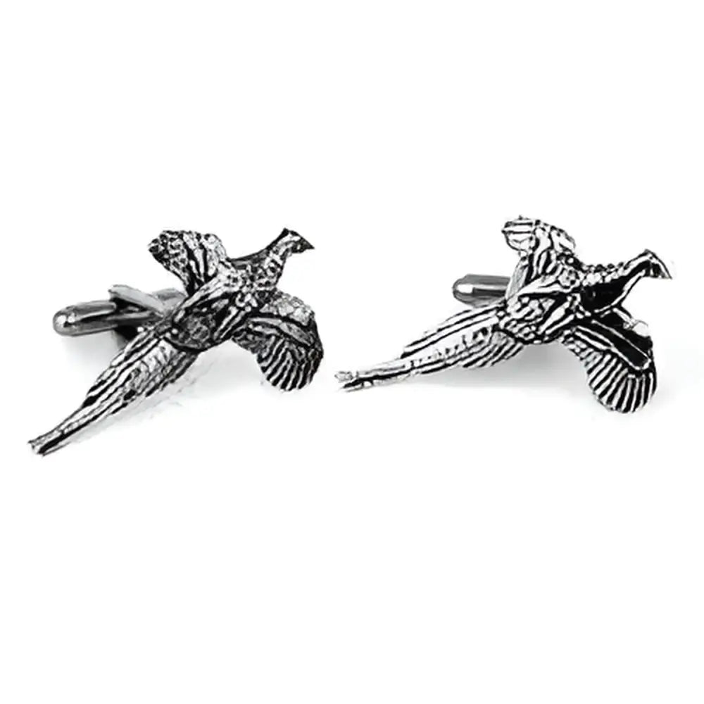 Silver-toned english made flying pheasant pewter cufflinks with detailed textured feathers and polished finish