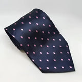 A navy blue silk equetech adult diamond showing tie with small pink and white diamond shaped dots riding tie
