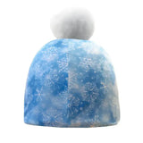 Blue childs fjord snowflake hat with white snowflake pattern and fluffy pom pom by equetech winter beanie