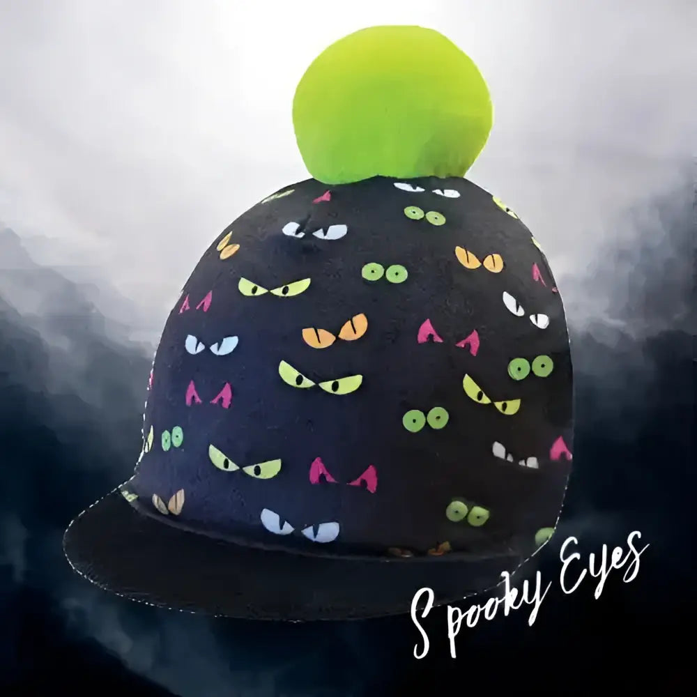 Black equetech childs spooky eyes pom hat silk with colorful cartoon eyes and bright green pom pom on top