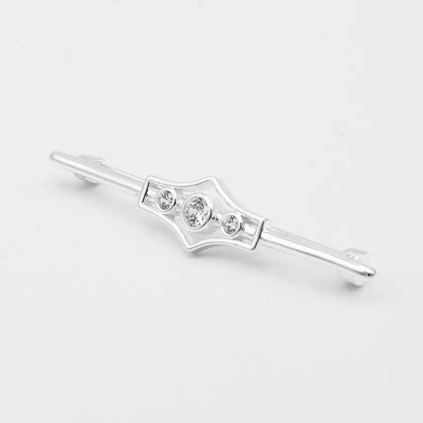 Silver-toned metal equetech deluxe gatsby stock pin with geometric shield design and three clear round stones