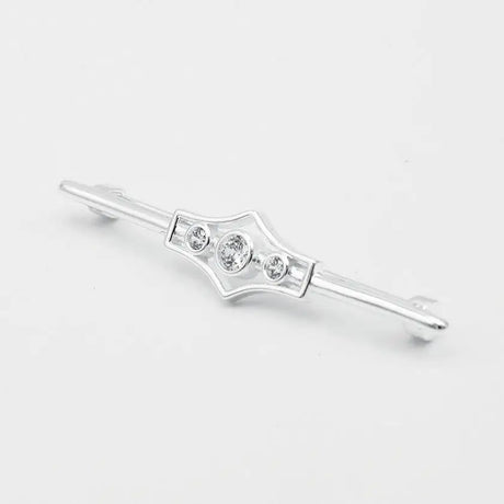 Silver-toned metal equetech deluxe gatsby stock pin with geometric shield design and three clear round stones