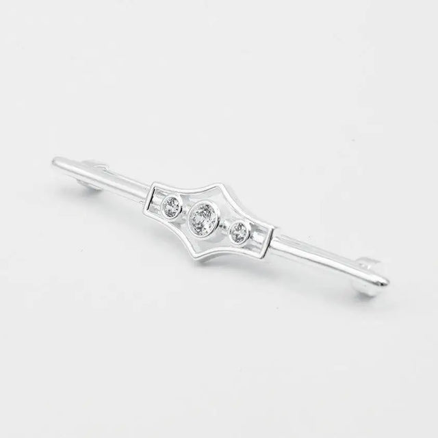 Silver-toned metal equetech deluxe gatsby stock pin with geometric shield design and three clear round stones
