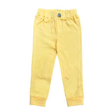 Bright yellow equetech dinky tots jodhpurs with elastic waistband and decorative button for kids riding fun