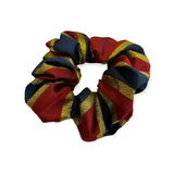 Equetech hair scrunchie in vibrant red navy blue and gold lurex stripe fabric with bold scrunchie lurex strips design