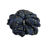 Navy blue equetech hair scrunchie with small gold polka dots jacquard hair accessory in scrunchie pin spot design