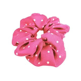 A vibrant pink equetech hair scrunchie with small white hair scrunchies polka dot pattern perfect for everyday use