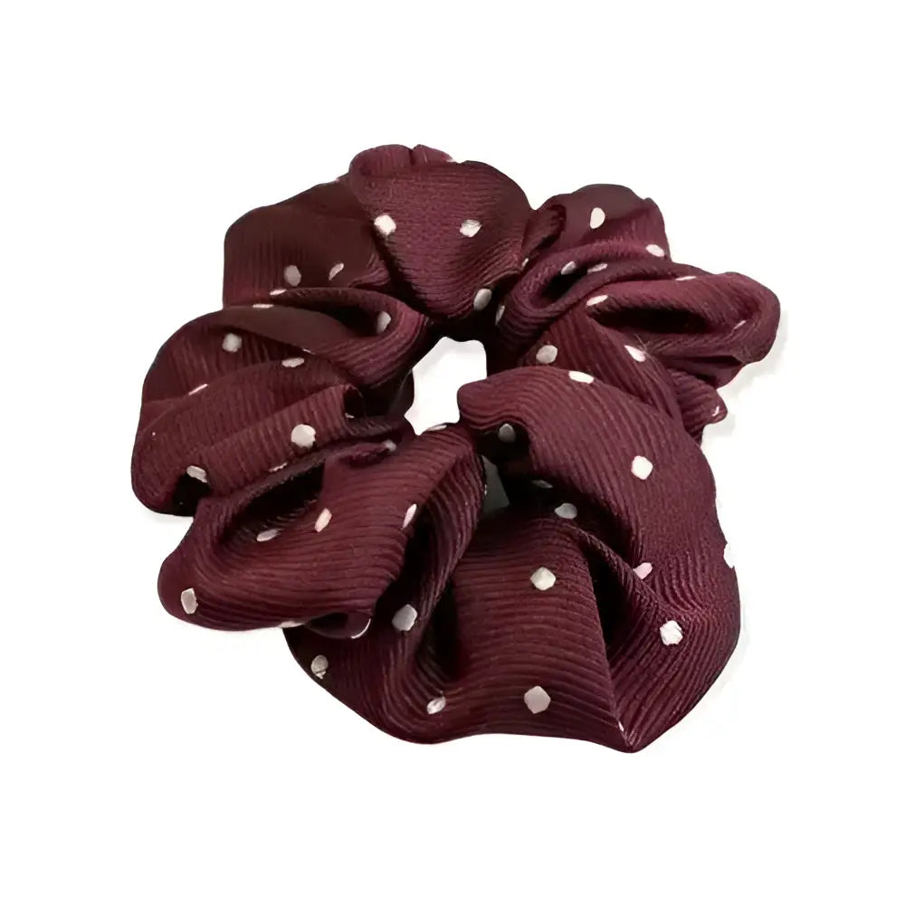 A maroon equetech hair scrunchie with white polka dots perfect for stylish hair scrunchies polka looks
