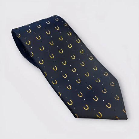 A navy blue silk equetech horseshoes show tie with gold horseshoes and white dots, one of the smartest riding ties equetech boasts