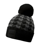 Black and gray equetech houndstooth waterproof knit hat with fluffy black pom pom knit for cold weather