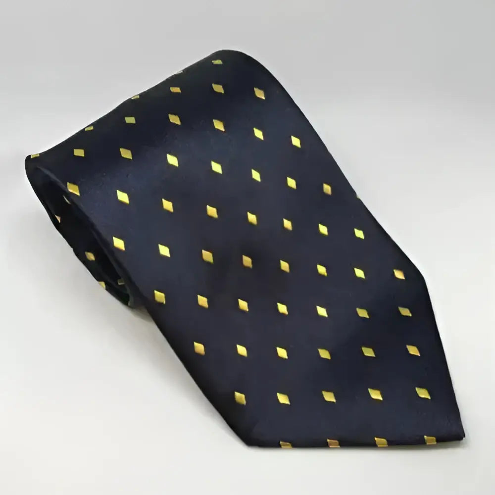 A navy blue silk equetech junior diamond tie with shiny gold diamond dots for junior diamond showing events