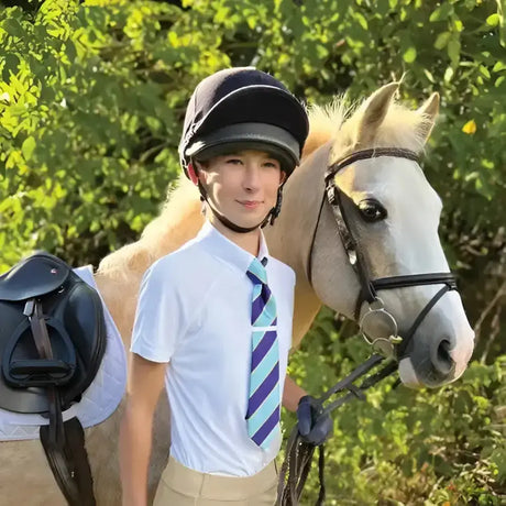 Black equestrian helmet with glossy finish and padded brim for equetech junior parade show-time use