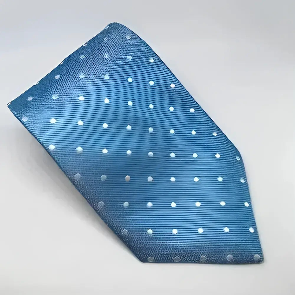 A blue silk pocket square from equetech junior polka dot ties with subtle stripes and white polka dots