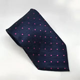 A navy blue silk equetech junior polka tie with subtle texture and pink polka dots perfect for junior polka dot ties
