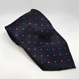 Dark navy silk equetech junior polka dot tie with subtle pink and gold polka dots junior polka dot ties