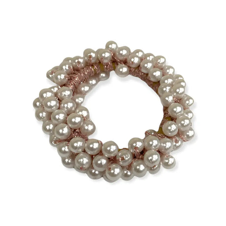 A delicate equetech pearl beaded scrunchie with multi-strand pearl cluster and soft pink woven band