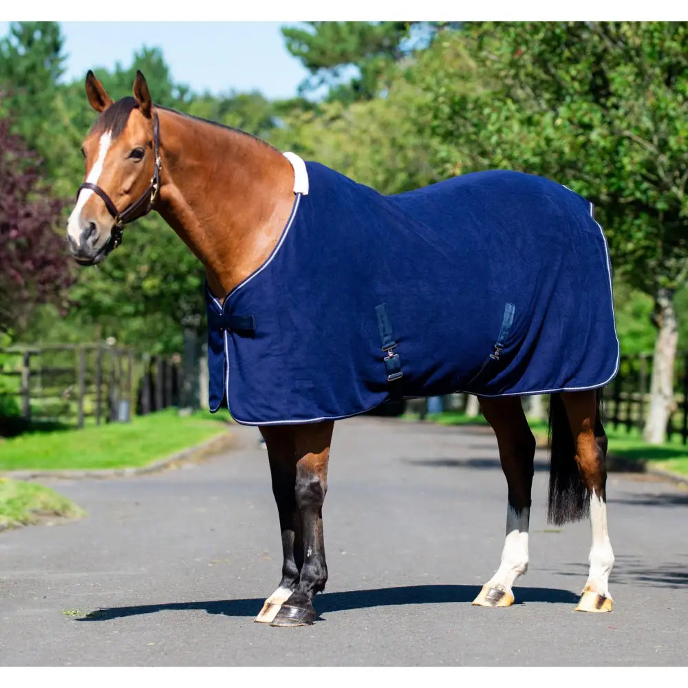 Navy blue equi-sential fleece cooler horse blanket with white trim adjustable straps and quality anti-pill fleece material