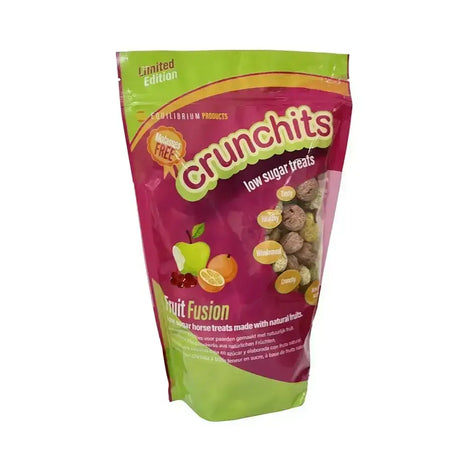 A vibrant pink and green glossy pouch of equilibrium crunchits fruit fusion low sugar horse treats with fruit illustrations