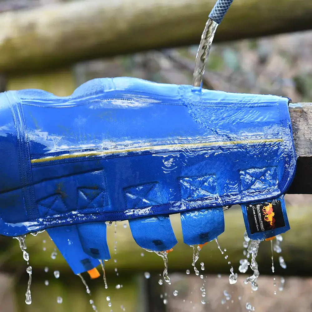 Blue waterproof equilibrium equi-chaps close contact chaps with yellow stitching rinsed for mud fever prevention