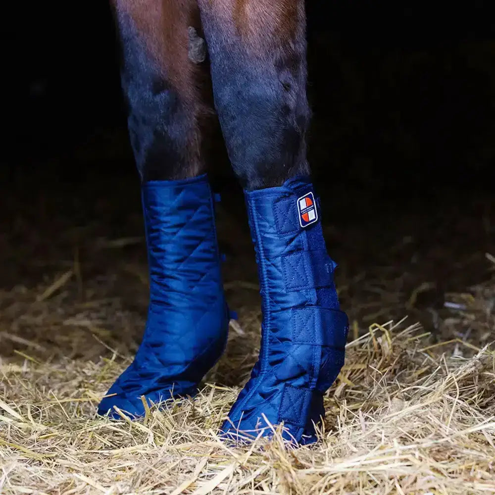 Blue quilted equi-chaps stable chaps with a small logo patch perfect as stable boots for horse legs