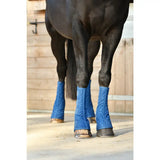 Blue quilted stable boots from equilibrium equi-chaps stable chaps designed for horse leg protection