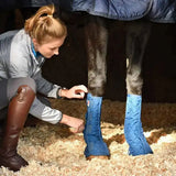 Blue quilted stable boots from equilibrium equi-chaps stable chaps for horse leg protection