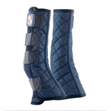 Navy blue quilted stable boots with dark gray velcro straps and brand patch from equilibrium equi-chaps stable chaps