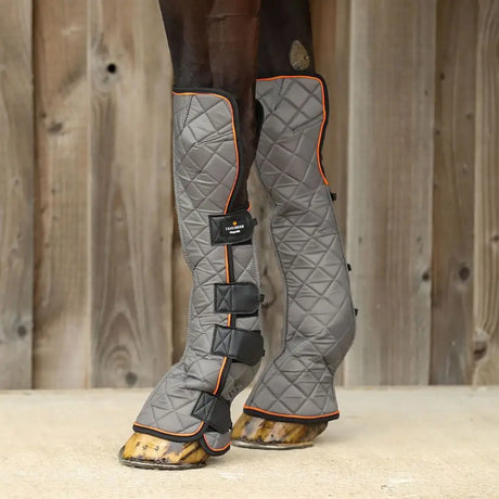 Equilibrium fore and knee magnetic chaps with gray quilted fabric orange trim and black straps support mobility and healthy tendons