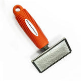 Equilibrium hook cleaner brush with orange textured grip and silver metal head featuring fine stainless steel pins prolongs cleaning