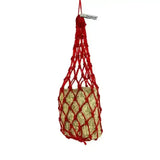 Red macrame small hole equilibrium munch net branded vitamunch holding a bale of hay for munch snacks
