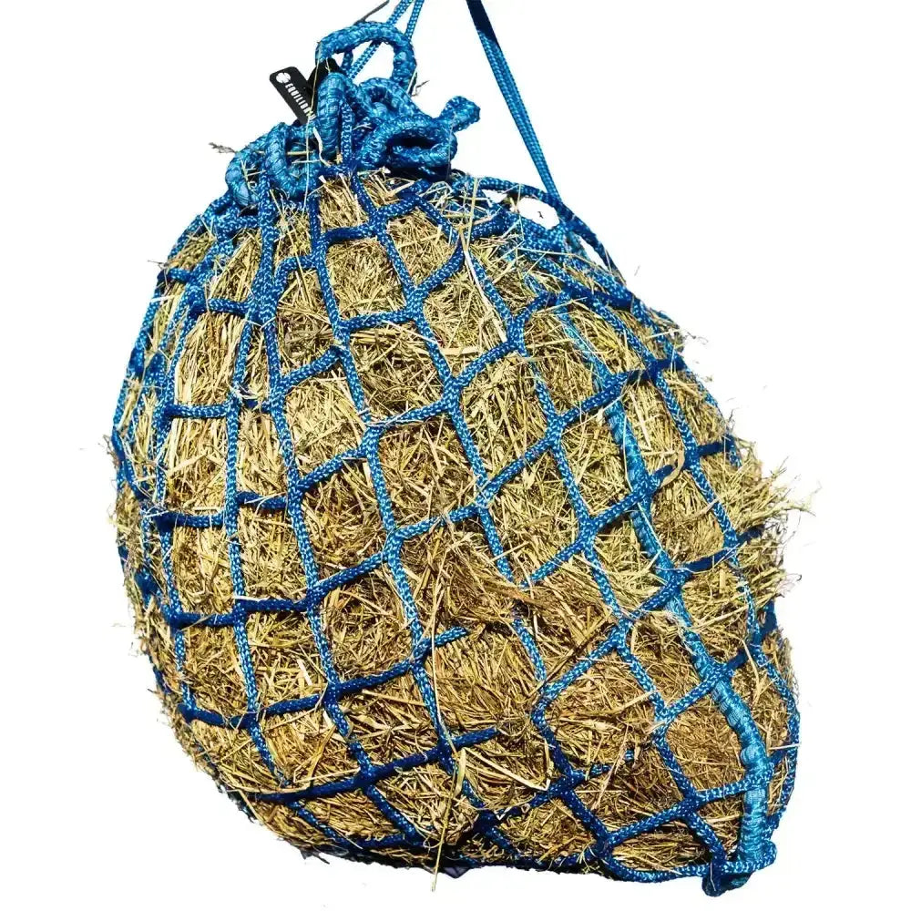 Blue woven netting bag filled with golden hay for equilibrium portionpacer 6cm haynet steady feeder use