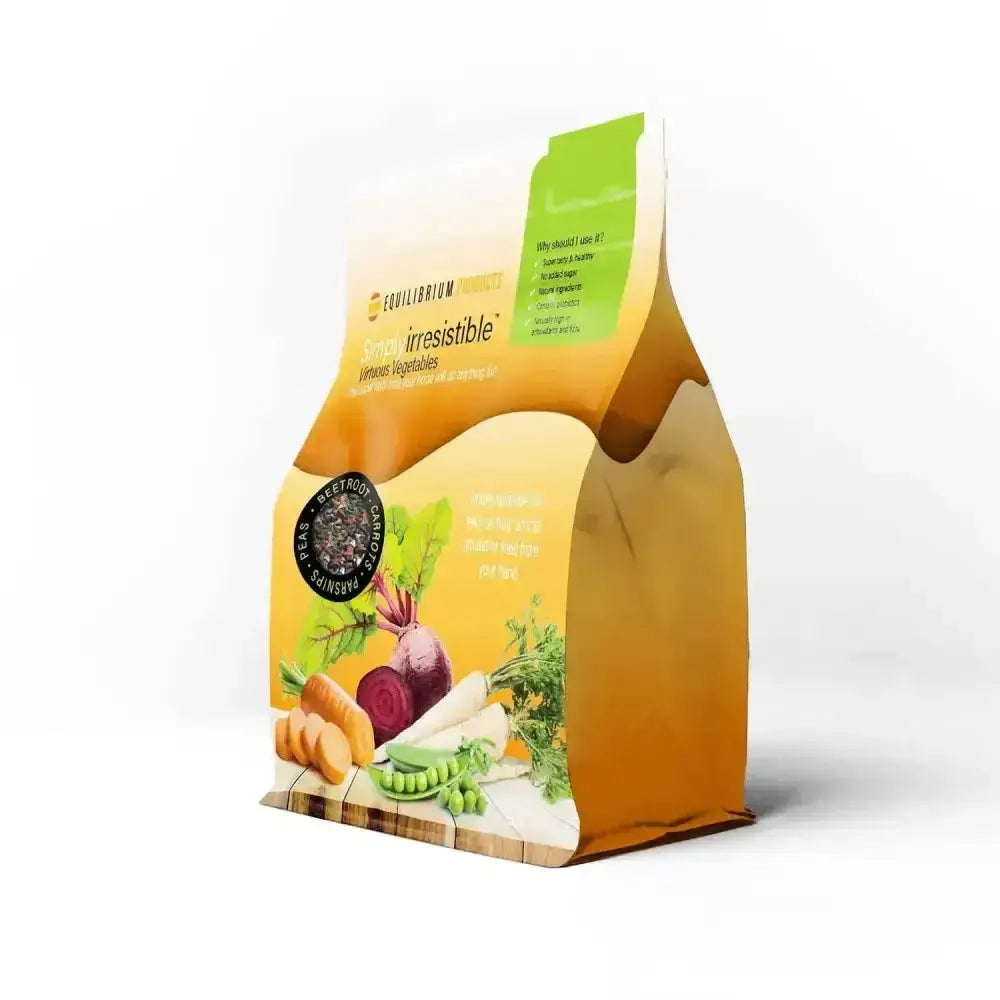 A vibrant orange and green pouch of equilibrium simply irresistible virtuous vegetable horse treats with mixed veggies design