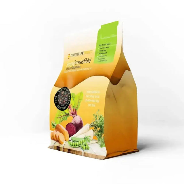 A vibrant orange and green pouch of equilibrium simply irresistible virtuous vegetable horse treats with mixed veggies design