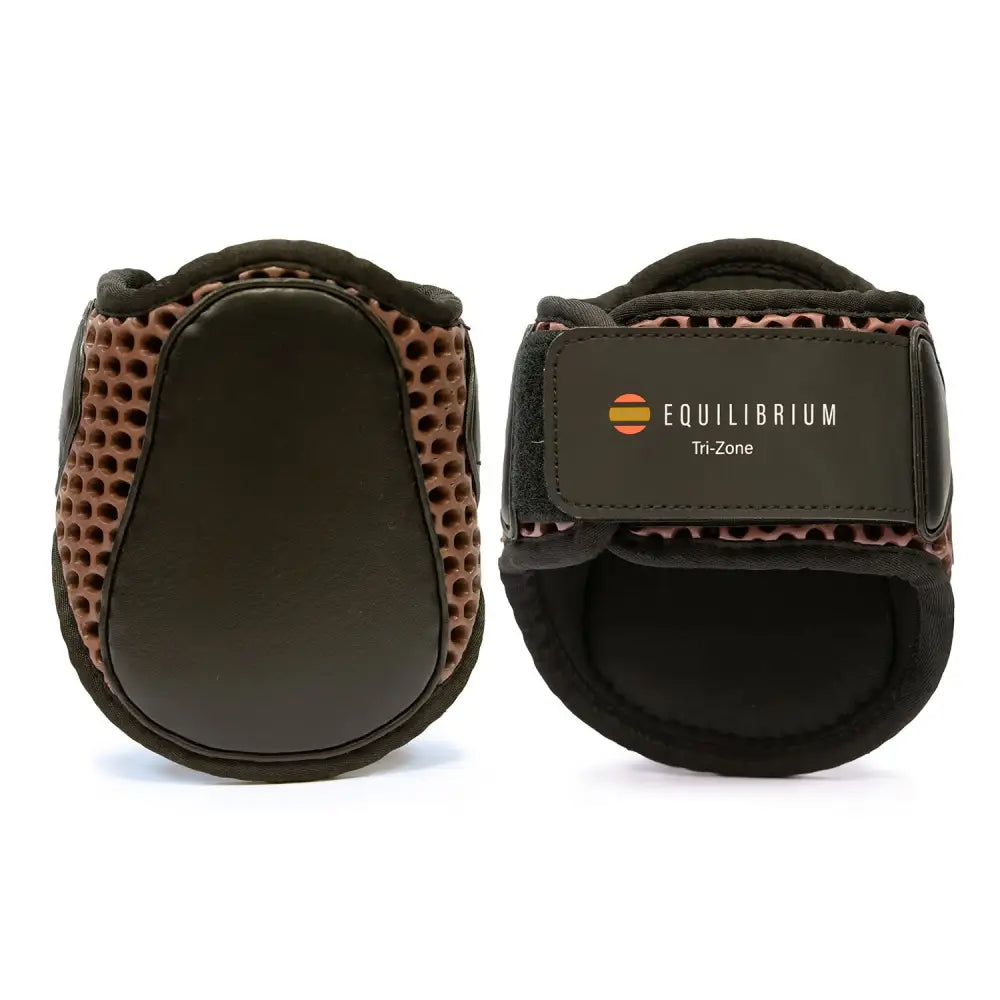 Black and brown equilibrium tri-zone fetlock boots with perforated mesh design super lightweight boots meeting protective boot standards set