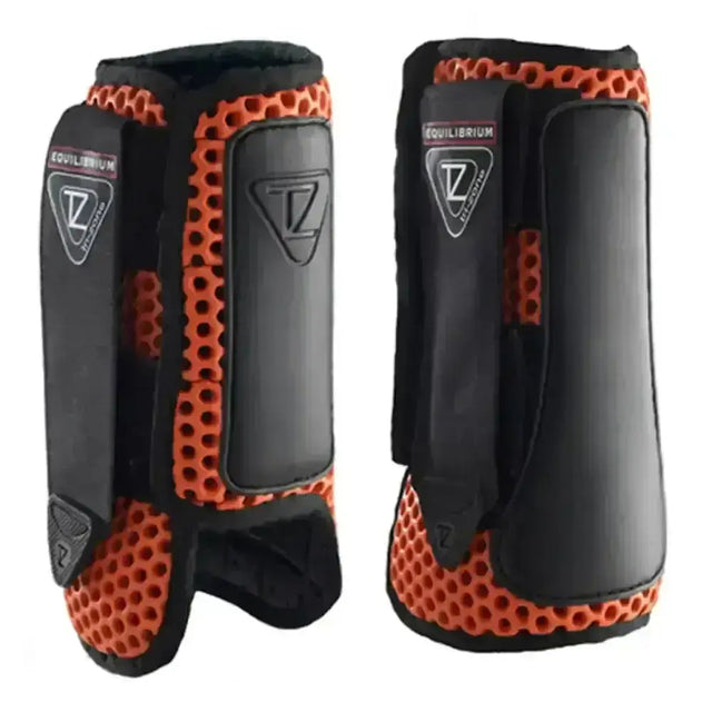 Black and orange equilibrium tri-zone impact sports boots red with perforated mesh panels and sleek protective design