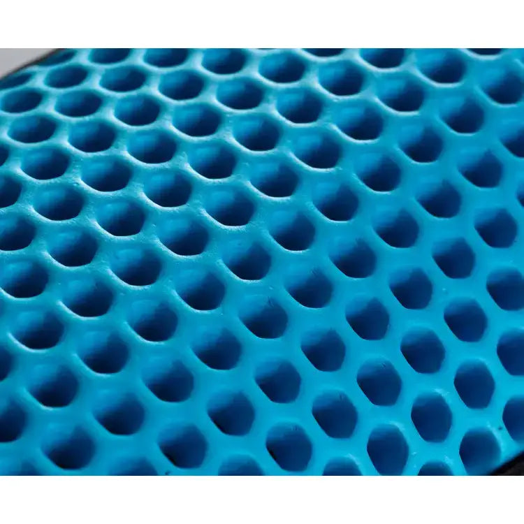 Bright blue silicone mat with hexagonal grid pattern for equilibrium tri-zone impact sports boots white cross country boots