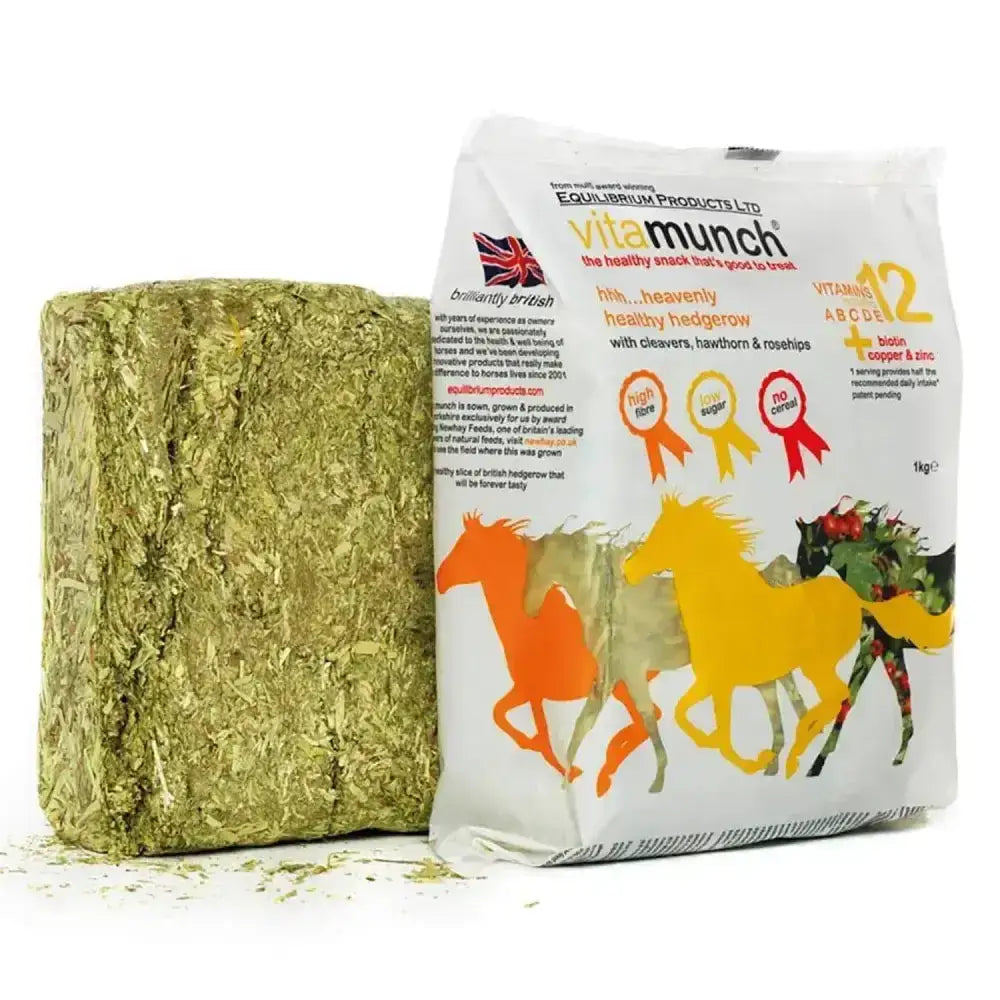 A rectangular block of compressed green hedges grass in a white vitamunch heavenly hedgerow bag with horse illustrations