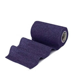 A roll of dark purple textured woven fabric elastic bandage equimed 10cm vetwrap single perfect for vet use