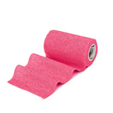 A roll of bright pink textured woven fabric equimed 10cm vetwrap single elastic bandage for secure pet care