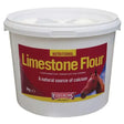 White plastic bucket with red and yellow equimins limestone flour label 3kg nutritional supplement for horses