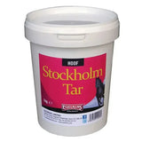 White plastic bucket of equimins stockholm tar with pink and black label for horse hoof care using pine tar