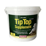 White plastic bucket of equimins tip top supplement powder with green label for horse supplements and essential minerals