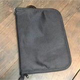 Black textured fabric equine passport holder with metallic zipper pull for keeping your horse’s passport safe during showing & plaiting