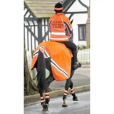 Bright orange equisafety hi viz wraparound winter exercise rug with reflective stripes and please pass wide and slow text on back