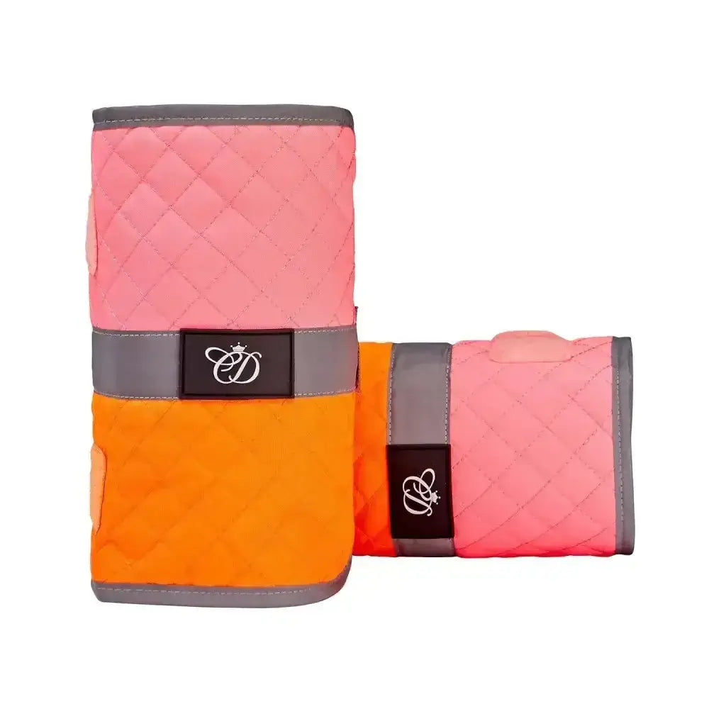 Equisafety leg boots in pink and orange quilted design with gray trim and black embroidered logo patches