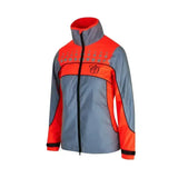 A high-visibility women’s equisafety mercury lightweight riding jacket in gray and bright orange with reflective dots on chest