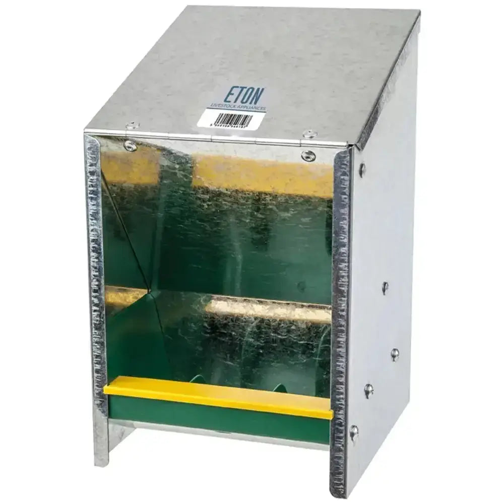 Silver metal eton hopper poultry feeder with green interior and yellow accents for standing feed or grit hopper use