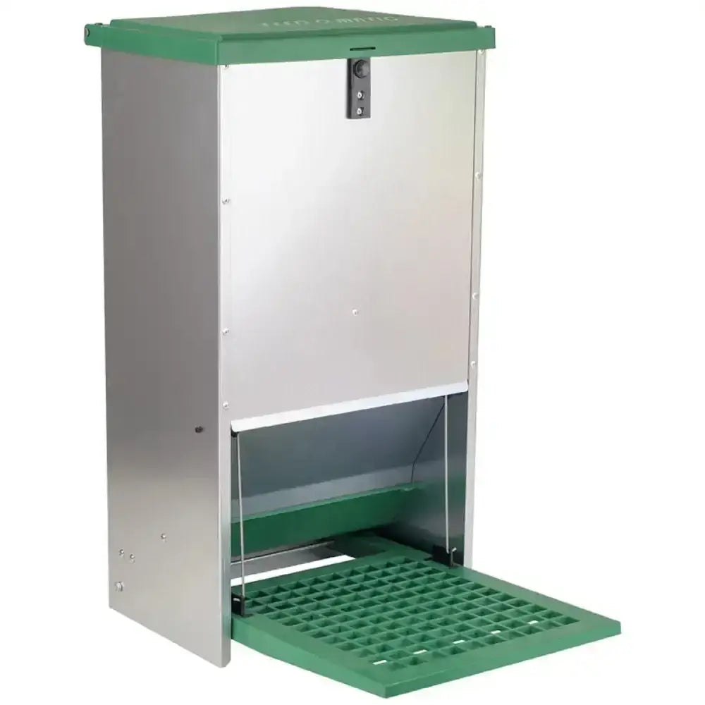 Eton treadle poultry automatic feeder with green plastic tray stainless steel body hinged door and quiet treadle action