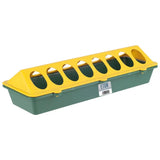 Green and yellow plastic trough feeder made with eight oval openings for easy chick trough poultry feeding
